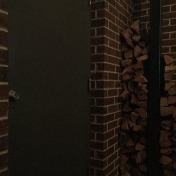Pacific Table - Back wall of the sheltered patio - Sushi Bars Near Me - Fort Worth, Texas