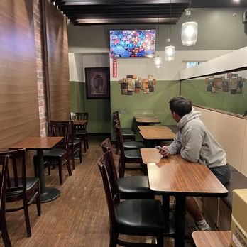 Verde Tea Cafe - a man sitting at a table - Cafes Near Me - Mountain View, California Verde Tea Cafe - a man sitting at a table - Cafes Near Me - Mountain View, California