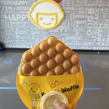 Happy Lemon - a person holding a bag of eggs - Bubble Tea Near Me - Conroe, Texas Happy Lemon - a person holding a bag of eggs - Bubble Tea Near Me - Conroe, Texas