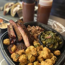 Johnson's Barbeque - Yummy! Pork ribs and brisket combo platter with fried okra  and perfectly flavored collard greens. Enough to share.