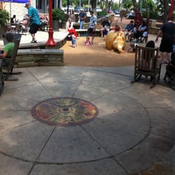 Century Oaks Park - Circular space in front of fireplace with 5 wooden rockers for lounging. Pups & kids welcome!