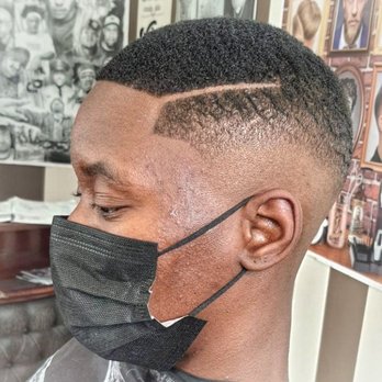Hector The Barber Shop - Mid skin fade and line Up - Barbers Near Me - Rota, California