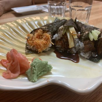 Happy Sushi - Left to right: spicy tuna, salmon skin, eel and cucumber hand rolls - Sushi Bars Near Me - Springfield, Illinois Happy Sushi - Left to right: spicy tuna, salmon skin, eel and cucumber hand rolls - Sushi Bars Near Me - Springfield, Illinois