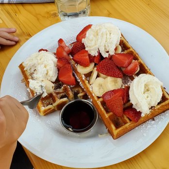 Cafe Zola - Big as your head waffle plate. The 6 year old still ate half of it. - French Near Me - Ann Arbor, Michigan Cafe Zola - Big as your head waffle plate. The 6 year old still ate half of it. - French Near Me - Ann Arbor, Michigan