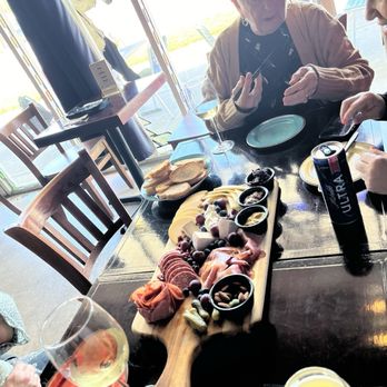 HopScotch Cafe - Mom looking happy with the spread! - Sandwiches Near Me - Dunedin, Florida HopScotch Cafe - Mom looking happy with the spread! - Sandwiches Near Me - Dunedin, Florida