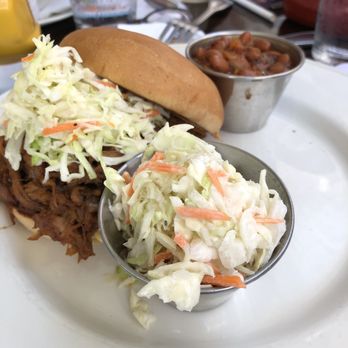Hard Rock Cafe - BBQ Pulled Pork Sandwich ($15.50) Hand-pulled smoked pork with house-made barbecue sauce - Burgers Near Me - Honolulu, Hawaii Hard Rock Cafe - BBQ Pulled Pork Sandwich ($15.50) Hand-pulled smoked pork with house-made barbecue sauce - Burgers Near Me - Honolulu, Hawaii