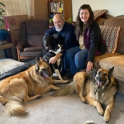 Los Rocosos Vineyards - Roger & Lucinda with their 4 dogs.