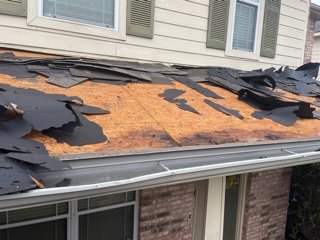 Slide of Arnold's Roofing