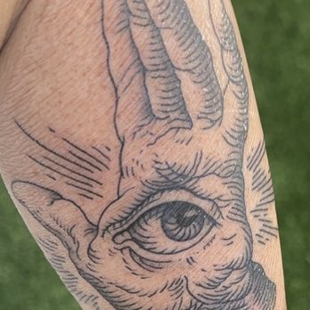 Black Diamond Tattoo - Eye in palm tattooed on upper-outer left forearm. *Tattoo covered with Derm Shield* - Tattoo Near Me - Venice, California Black Diamond Tattoo - Eye in palm tattooed on upper-outer left forearm. *Tattoo covered with Derm Shield* - Tattoo Near Me - Venice, California