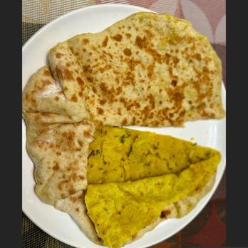 Priya Indian Cuisine - Aloo Paratha - Indian Near Me - Lowell, Massachusetts Priya Indian Cuisine - Aloo Paratha - Indian Near Me - Lowell, Massachusetts