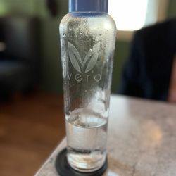 Juniper - Water bottle on every table.
