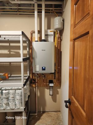 Woody's Water Heaters And Plumbing Services Logo