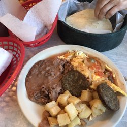 Reyna's Taco - Huevos Rancheros with sausage