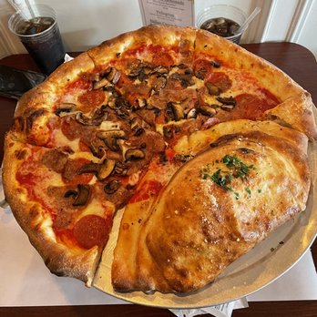 Amano - Pepperoni, mushroom and sausage pizza pie-zoni, inside the calzone was meatballs, ricotta cheese and mozzarella. Soooo good! - Pizza Near Me - Las Vegas, Nevada