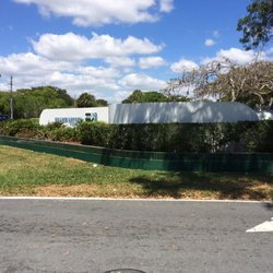Wash The World - sign and wall plus tile pressure cleaned