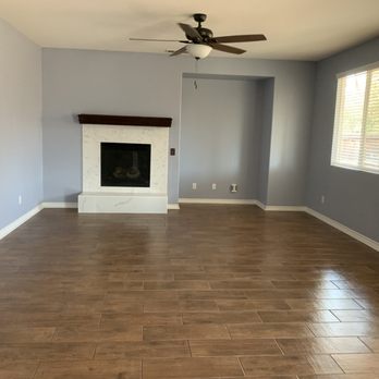 Fausto's Help - Installed tiles to floor and fireplace - Fences & Gates Near Me