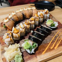 Top to bottom - Mega Salmon roll, Munchie Munchie roll, Awesome roll Top to bottom - Mega Salmon roll, Munchie Munchie roll, Awesome roll