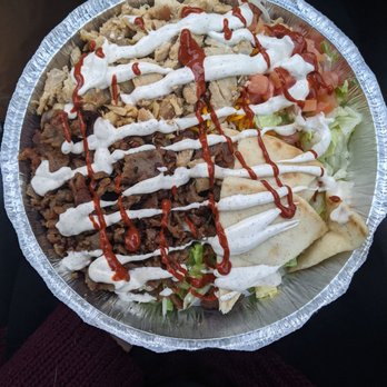 The Halal Guys - Combo plate- with white and red sauce - Halal Near Me - Costa Mesa, California