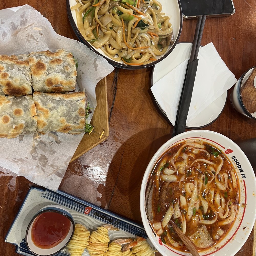 Noodle St - Spicy Beef Noodle Soup; Potato String Shrimp; knife cut stir fry noodle with shrimp; Beef Roll Pancake - Noodles Near Me - Fullerton, California Noodle St - Spicy Beef Noodle Soup; Potato String Shrimp; knife cut stir fry noodle with shrimp; Beef Roll Pancake - Noodles Near Me - Fullerton, California