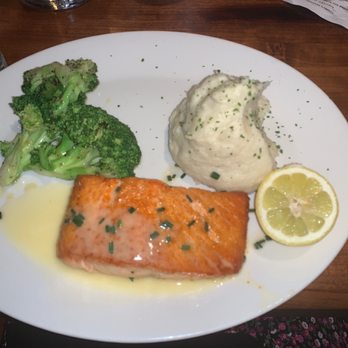 Stoney River - Pan-Roasted Cold Water Salmon* with Garlic Whipped Potatoes and broccoli - Steakhouses Near Me - Franklin, Tennessee Stoney River - Pan-Roasted Cold Water Salmon* with Garlic Whipped Potatoes and broccoli - Steakhouses Near Me - Franklin, Tennessee