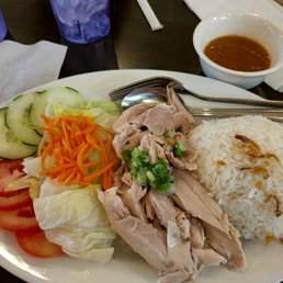 Hainanese chicken rice with ginger dip sauce, boneless dark meat, chicken soup (not pictured) on the side Hainanese chicken rice with ginger dip sauce, boneless dark meat, chicken soup (not pictured) on the side