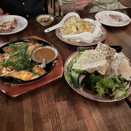 Catfish, veggie fried rice and rice crackers. Catfish, veggie fried rice and rice crackers.