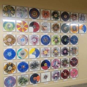 The Stutz - A wall of vinyl... - Shared Office Spaces Near Me - Indianapolis, Indiana