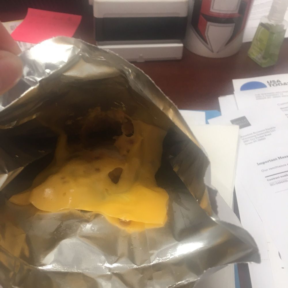 I order filets with cheese and no bun all the time and I've never seen it packaged like this before... its even missing the pickles.