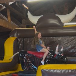 Best Mechanical Bull Rental - This face says it all! After falling her first few tries, she finally made it to the 10 second count down and knew she had succeeded!!