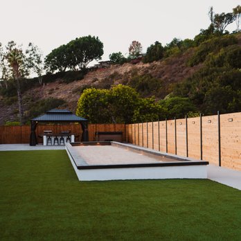 Jimenez Landscaping - Full Backyard Remodel includes Turf, Fence, Concrete, and Bocce Ball Court - Landscaping Near Me Jimenez Landscaping - Full Backyard Remodel includes Turf, Fence, Concrete, and Bocce Ball Court - Landscaping Near Me