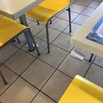 McDonald's - yellow chairs and tables in a restaurant - Burgers Near Me - White Hall, Arkansas