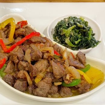 Erta Ale Ethiopian Restaurant - Lamb Tibs Marinated pieces of lamb cooked with peppers , onions , garlic, tomato, a touch of rosemary and other spices. - Ethiopian Near Me - Saint Paul, Minnesota Erta Ale Ethiopian Restaurant - Lamb Tibs Marinated pieces of lamb cooked with peppers , onions , garlic, tomato, a touch of rosemary and other spices. - Ethiopian Near Me - Saint Paul, Minnesota
