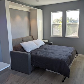 Robles Remodeling - Murphy bed converts living area into guest room - General Contractors Near Me Robles Remodeling - Murphy bed converts living area into guest room - General Contractors Near Me