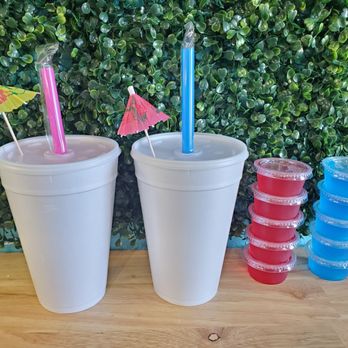 Dynamite Daiquiris 2 Go - two plastic cups with straws and umbrellas - Drive-Thru Bars Near Me - Hamilton, Texas Dynamite Daiquiris 2 Go - two plastic cups with straws and umbrellas - Drive-Thru Bars Near Me - Hamilton, Texas