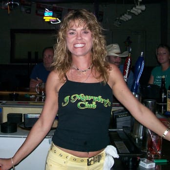 J Murphy's Club - a woman standing at a bar - Pool Halls Near Me - Dallas, Texas J Murphy's Club - a woman standing at a bar - Pool Halls Near Me - Dallas, Texas