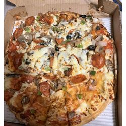 Casey's - A half sided suprem pizza that wasn't even sliced. Never again
