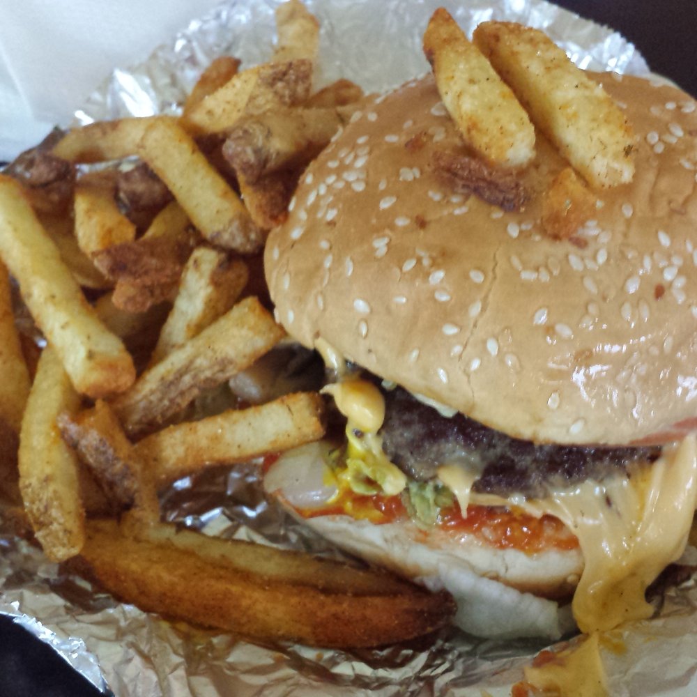 Five Guys - Cheeseburger "All The Way" plus relish, and overflow cajun fries - Burgers Near Me - Morgan Hill, California Five Guys - Cheeseburger "All The Way" plus relish, and overflow cajun fries - Burgers Near Me - Morgan Hill, California