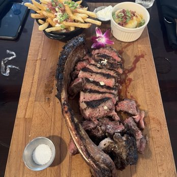 Southern Vine’s - Tomahawk ribeye - Bars Near Me - Benson, North Carolina Southern Vine’s - Tomahawk ribeye - Bars Near Me - Benson, North Carolina