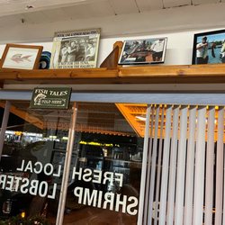 Fish Tales Market & Eatery - Memorabilia above our table