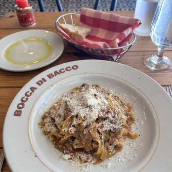Bocca di Bacco - Fettuccine Bolognese with fresh grated Parmesan cheese - Italian Near Me - New York, New York