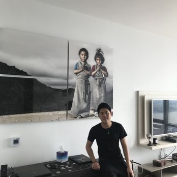 Sprucing Up NYC - Eugene Hudson yards National Geographic photograph Art hanging and TV mounting. Handyman service Lorenzo 646-352-3959 - Handyman Near Me