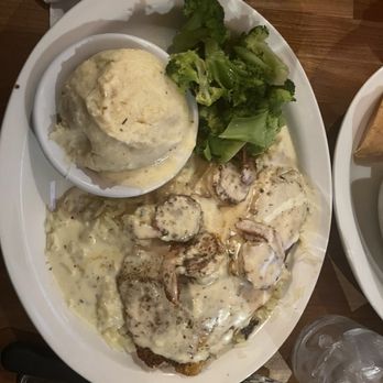 Cheddar's Scratch Kitchen - Creamy Garlic Tilapia & Shrimp - A meal featuring chicken with creamy sauce, mashed potatoes, broccoli, and rice on a white plate. - Comfort Food Near Me - Florence, Kentucky