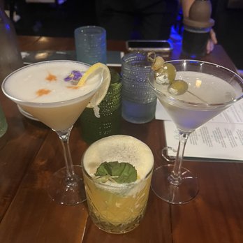 The Boardroom - Left to right. Whisky sour, passion fruit pau hana and roasted garlic and blue cheese olive martini - Cocktail Bars Near Me - Kailua, Hawaii The Boardroom - Left to right. Whisky sour, passion fruit pau hana and roasted garlic and blue cheese olive martini - Cocktail Bars Near Me - Kailua, Hawaii
