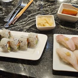 Butter fish nigiri, yellowtail nigiri, Philadelphia roll Butter fish nigiri, yellowtail nigiri, Philadelphia roll