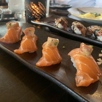 Raisu - Signature salmon nigiri (wouldn't order next time, overpowered by butter) - Japanese Near Me - Chicago, Illinois Raisu - Signature salmon nigiri (wouldn't order next time, overpowered by butter) - Japanese Near Me - Chicago, Illinois