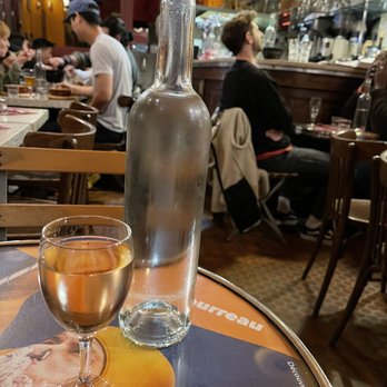 Bistro des Augustins - Interior at a small table with a glass of wine - Bistros Near Me - Paris, 75