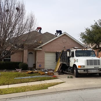 Rocking J Construction - a man on a roof working on a house - Roofing Near Me - Grapevine, Texas Rocking J Construction - a man on a roof working on a house - Roofing Near Me - Grapevine, Texas