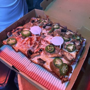 The Salt Water Hippie - 4 slice square pizza with sausage, jalapeño and mushroom - Bars Near Me - Madeira Beach, Florida The Salt Water Hippie - 4 slice square pizza with sausage, jalapeño and mushroom - Bars Near Me - Madeira Beach, Florida