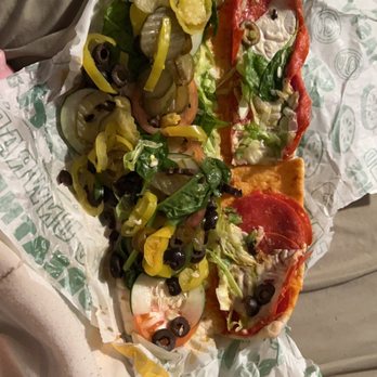 Subway - a plate of pizza and salad on a bed - Sandwiches Near Me - Dalton, Georgia Subway - a plate of pizza and salad on a bed - Sandwiches Near Me - Dalton, Georgia