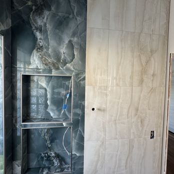 Sun Country Customs - The lighted nook has 20 pieces of every size and shape, meticulously cut to the pattern of the tile wrapping around. - General Contractors Near Me Sun Country Customs - The lighted nook has 20 pieces of every size and shape, meticulously cut to the pattern of the tile wrapping around. - General Contractors Near Me